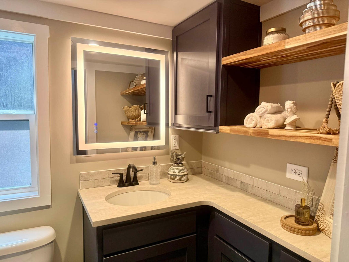 Honey Hollow bathroom vanity with lighted mirror and open wood shelves